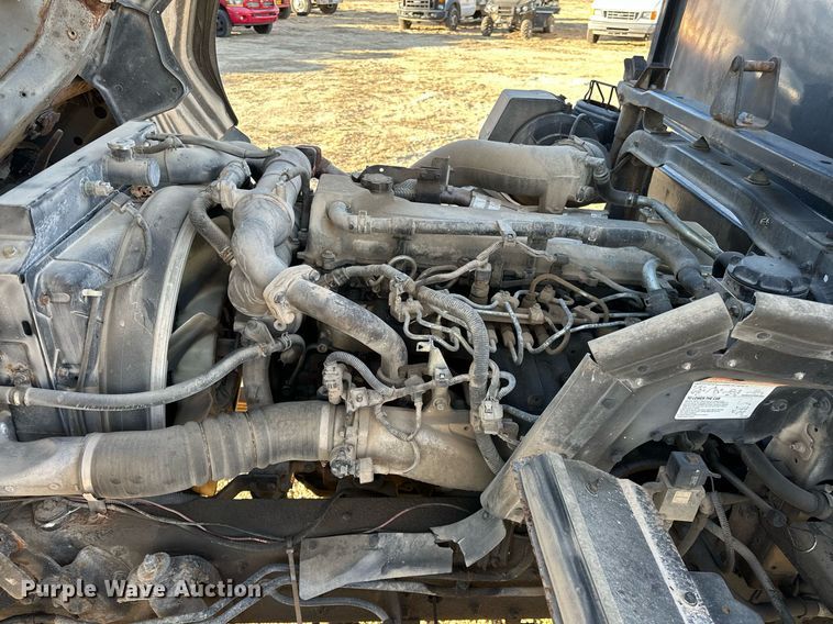 image for item OM9877 2010 Nissan  2600LP UD rollback truck