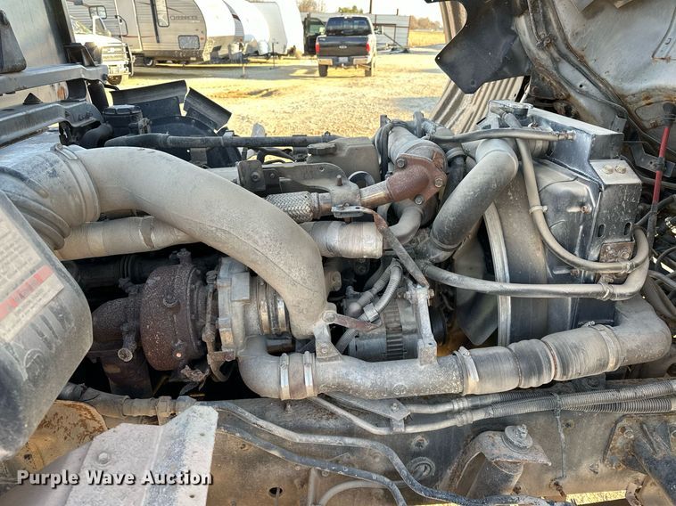 image for item OM9877 2010 Nissan  2600LP UD rollback truck