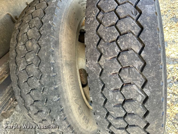 image for item OM9877 2010 Nissan  2600LP UD rollback truck