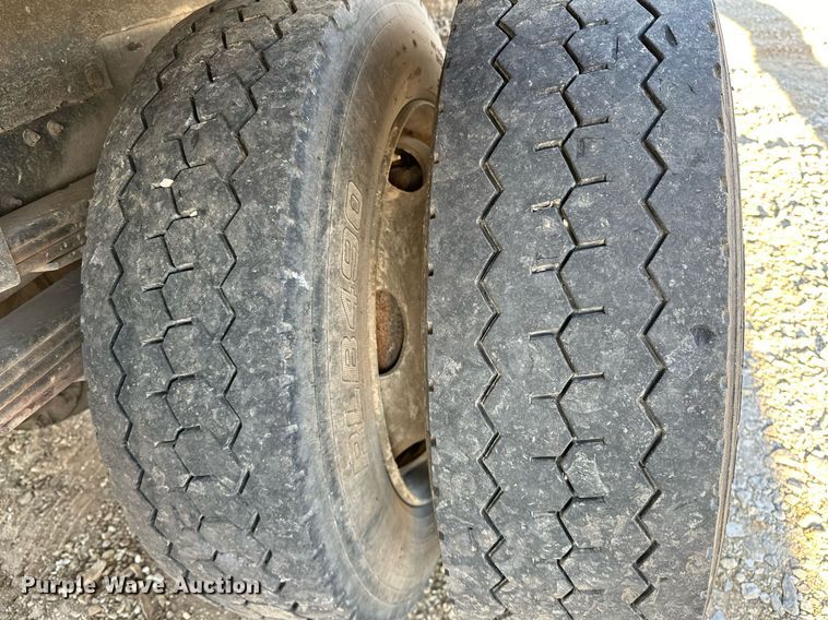 image for item OM9877 2010 Nissan  2600LP UD rollback truck