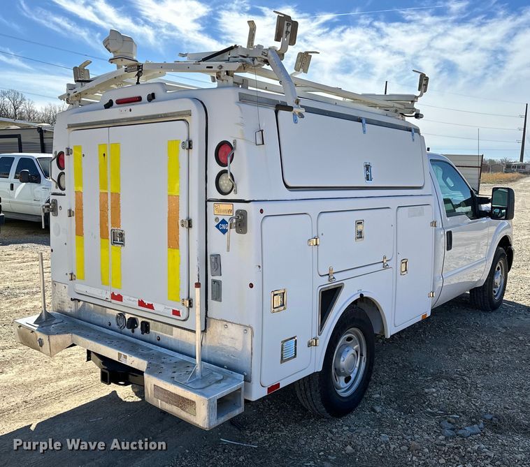 image for item OM9880 2013 Ford F350 Super Duty XL utility bed pickup truck