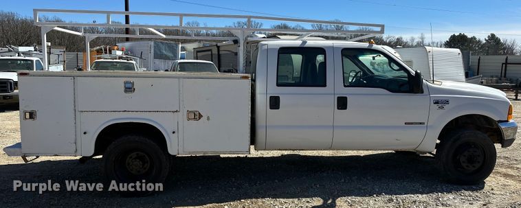 image for item OM9881 1999 Ford F550 Super Duty Crew Cab utility / service truck