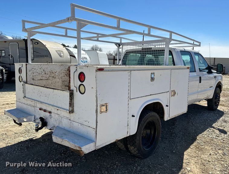 image for item OM9881 1999 Ford F550 Super Duty Crew Cab utility / service truck