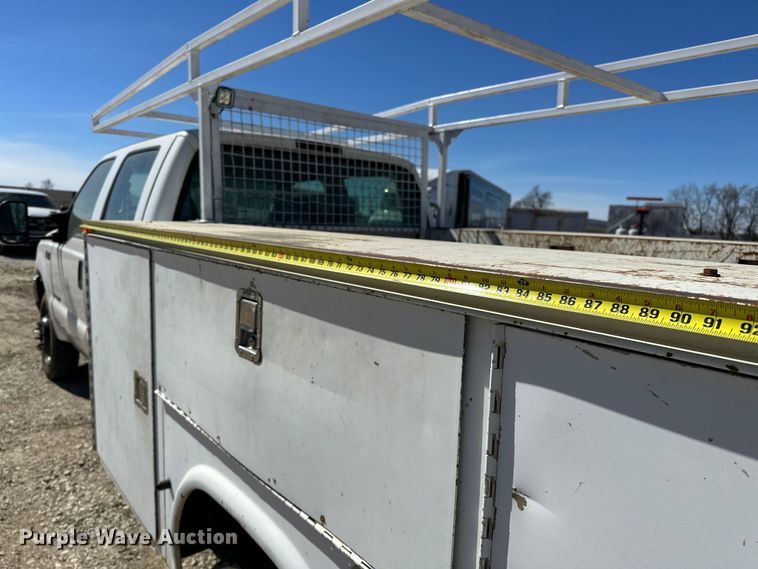 image for item OM9881 1999 Ford F550 Super Duty Crew Cab utility / service truck