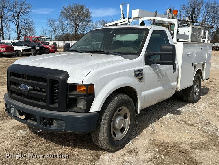 image for item OM9883 2008 Ford  F350 Super Duty XL utility bed pickup truck