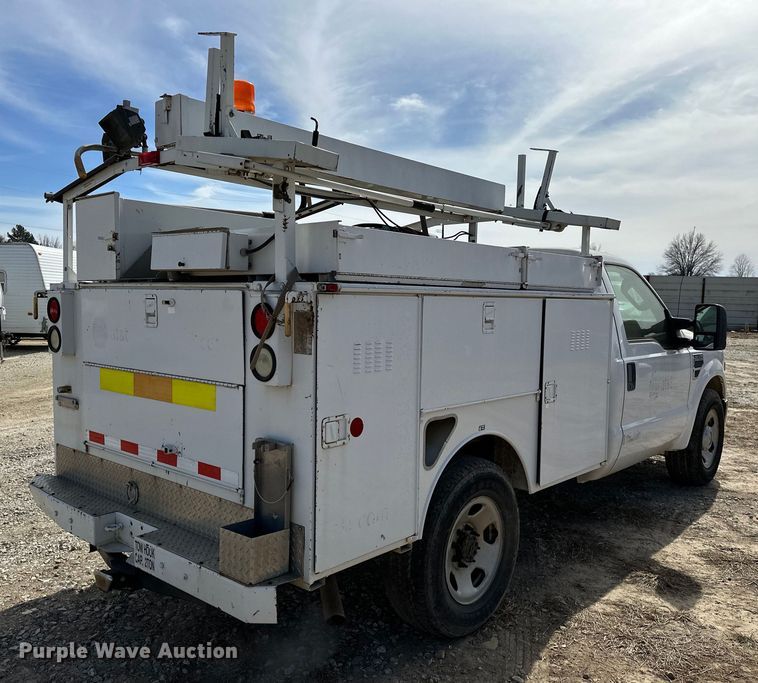 image for item OM9883 2008 Ford  F350 Super Duty XL utility bed pickup truck