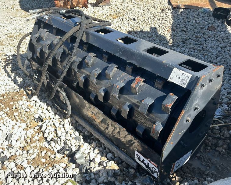 image for item EI0700 Landhonor skid steer padded vibratory roller