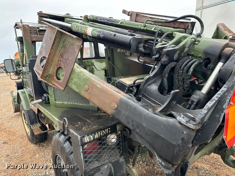 image for item EJ0304 Freightliner Unimog FLU419 emplacement excavator