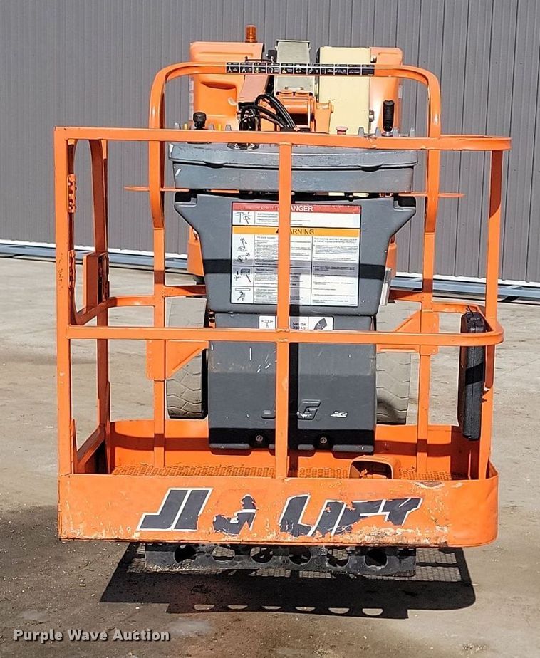 image for item LA9677 2007 JLG E300AJ boom lift