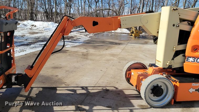 image for item LA9677 2007 JLG E300AJ boom lift
