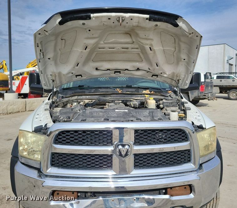 image for item LC9834 2014 Dodge Ram 5500 Crew Cab flatbed pickup truck