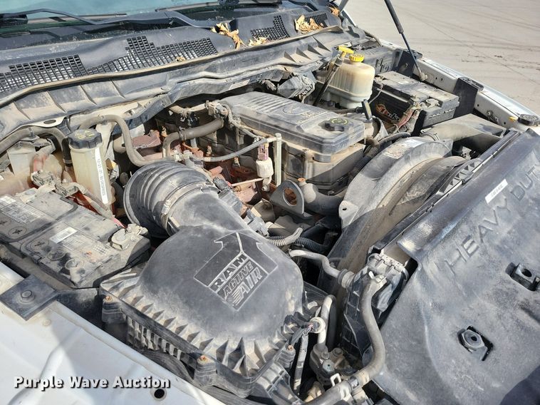 image for item LC9834 2014 Dodge Ram 5500 Crew Cab flatbed pickup truck