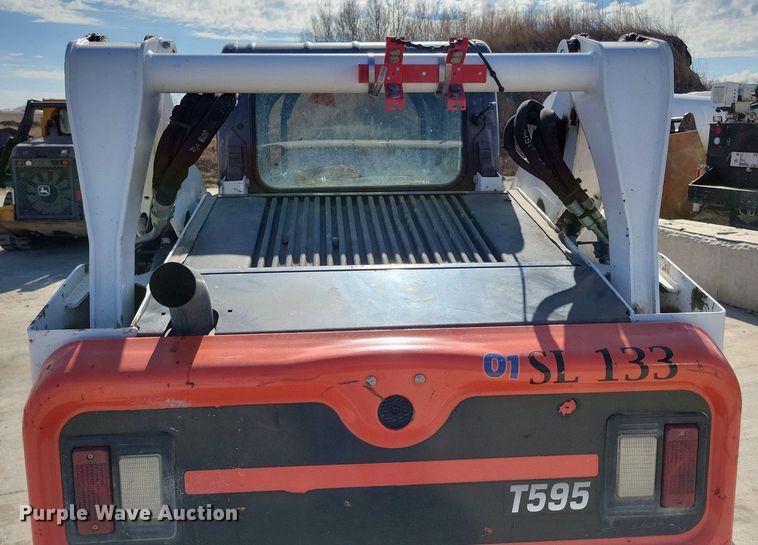 image for item LC9840 2019 Bobcat T595 tracked skid steer loader