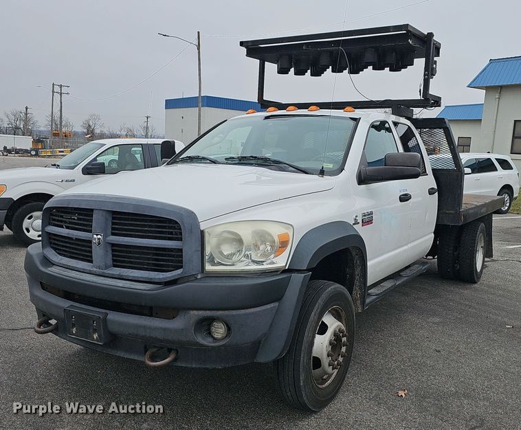 image for item EJ6082 2010 Dodge Ram 5500HD Quad Cab flatbed truck