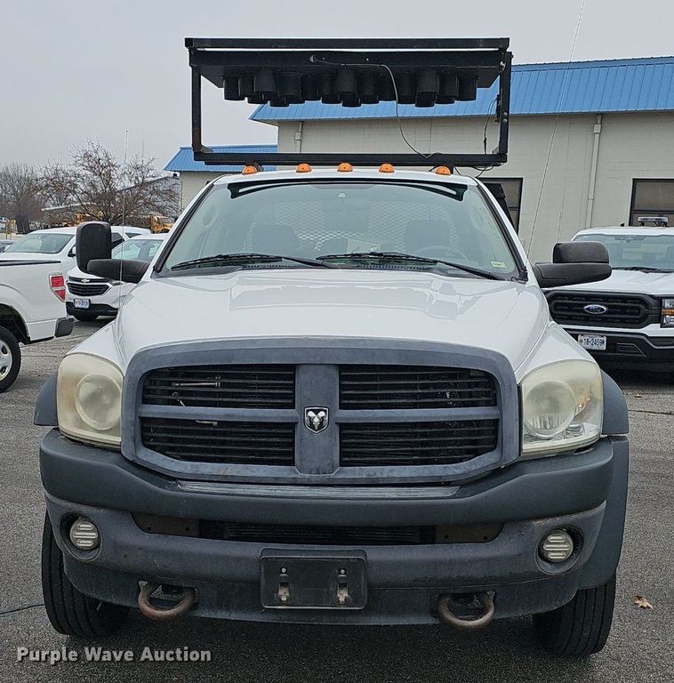 image for item EJ6082 2010 Dodge Ram 5500HD Quad Cab flatbed truck