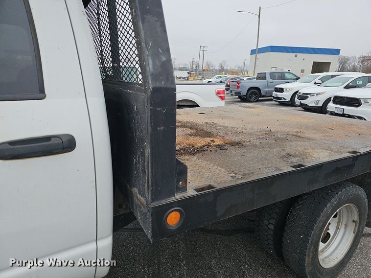 image for item EJ6082 2010 Dodge Ram 5500HD Quad Cab flatbed truck