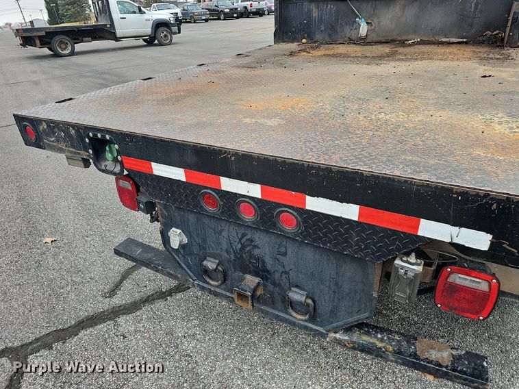 image for item EJ6082 2010 Dodge Ram 5500HD Quad Cab flatbed truck