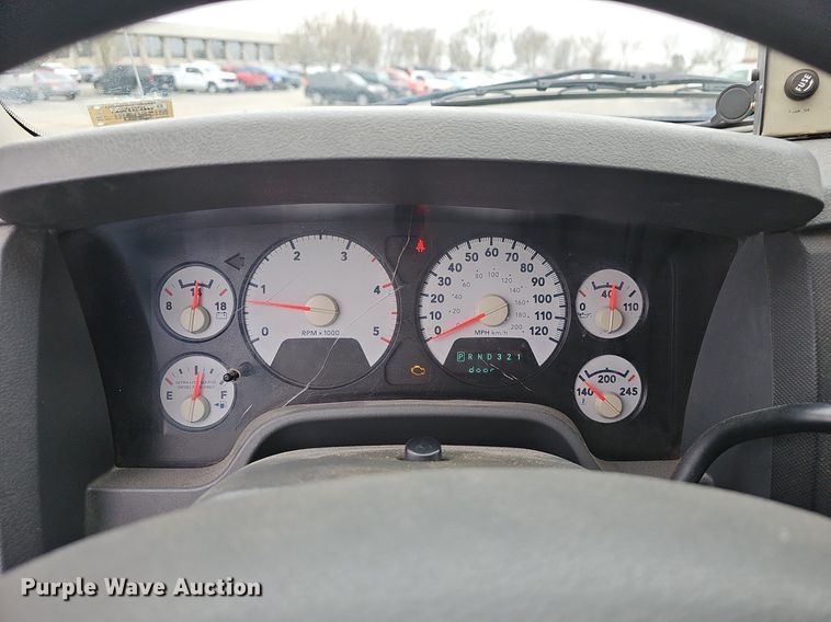 image for item EJ6082 2010 Dodge Ram 5500HD Quad Cab flatbed truck