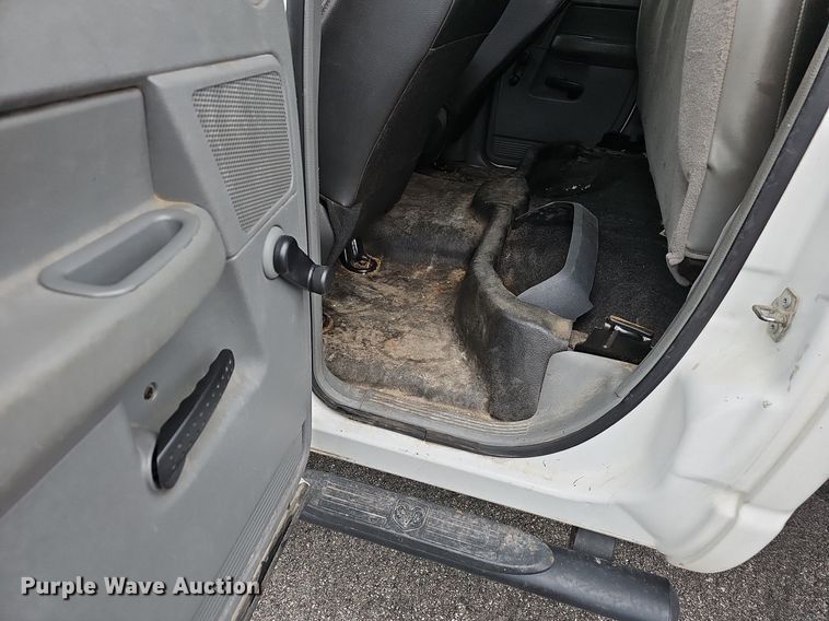 image for item EJ6082 2010 Dodge Ram 5500HD Quad Cab flatbed truck