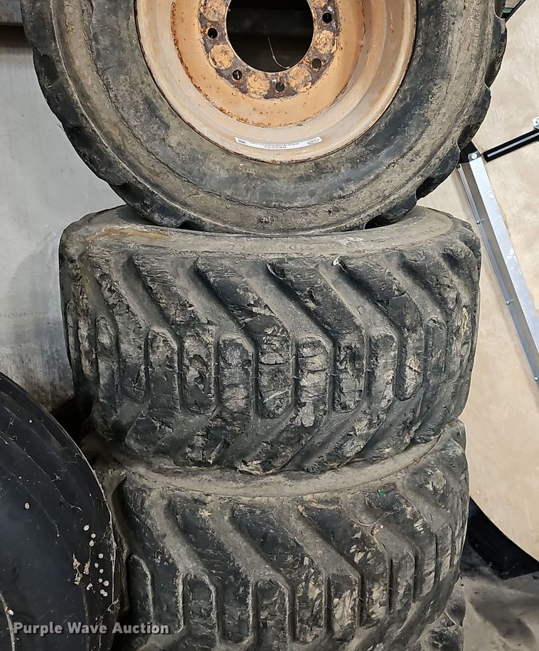 image for item EK5543 (4) Galaxy 33x15.5-16 skid steer tires and wheels