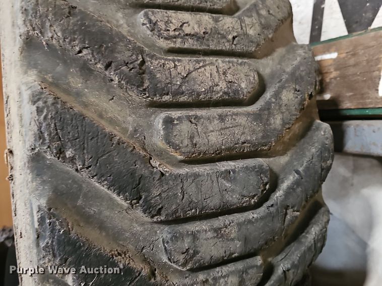 image for item EK5543 (4) Galaxy 33x15.5-16 skid steer tires and wheels