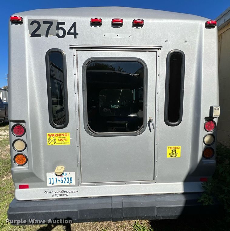 image for item MH9932 2013 Ford E350 Super Duty El Dorado shuttle bus