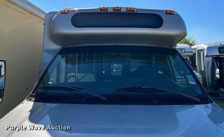 image for item MH9932 2013 Ford E350 Super Duty El Dorado shuttle bus