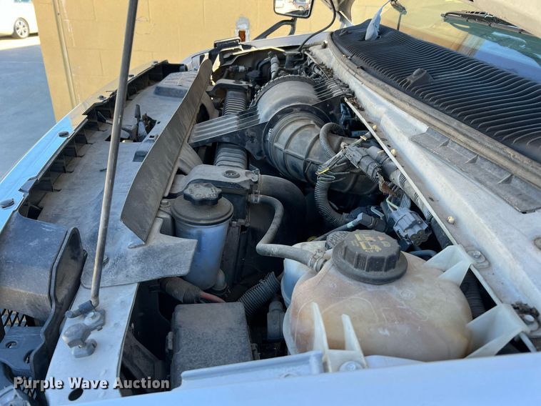 image for item MH9932 2013 Ford E350 Super Duty El Dorado shuttle bus