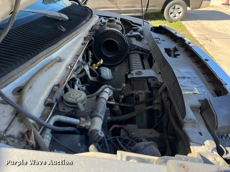 image for item MH9932 2013 Ford E350 Super Duty El Dorado shuttle bus