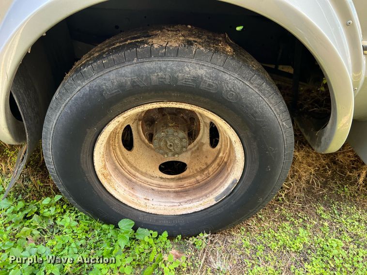 image for item MH9932 2013 Ford E350 Super Duty El Dorado shuttle bus