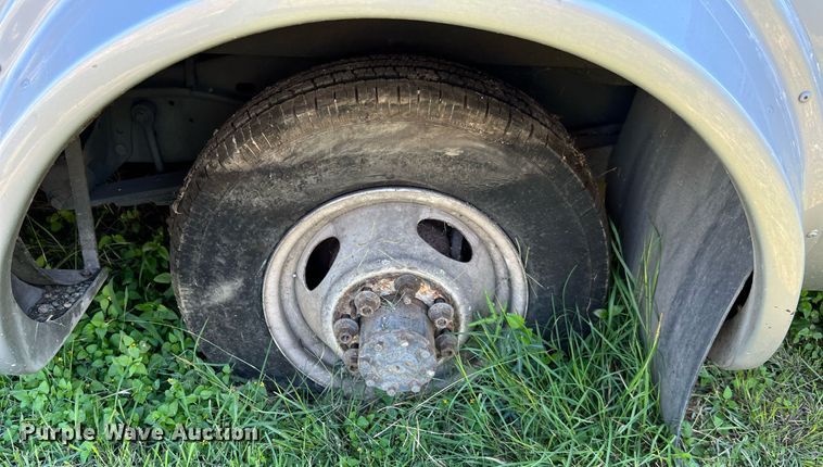 image for item MH9932 2013 Ford E350 Super Duty El Dorado shuttle bus