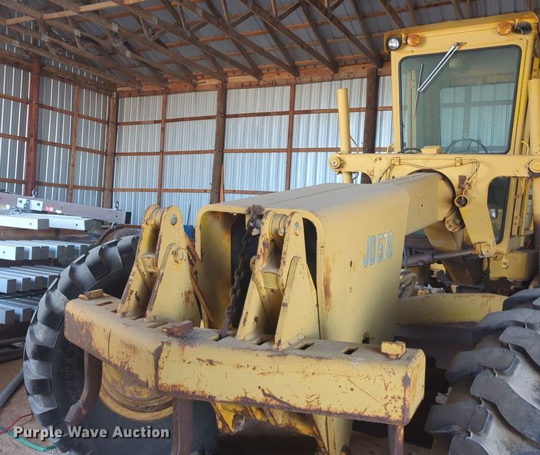 image for item NZ9378 John Deere  570 motor grader