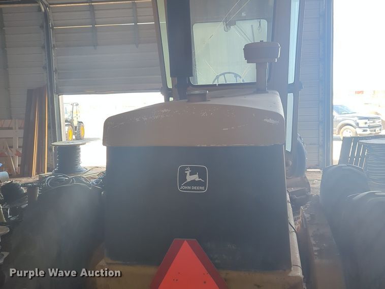 image for item NZ9378 John Deere  570 motor grader