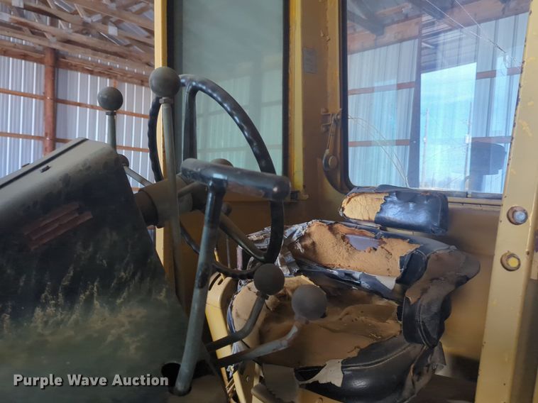 image for item NZ9378 John Deere  570 motor grader