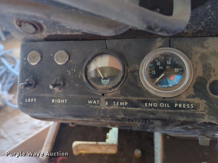 image for item NZ9378 John Deere  570 motor grader