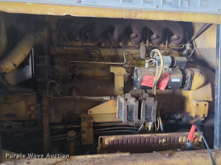 image for item NZ9378 John Deere  570 motor grader