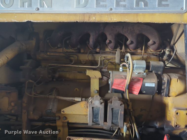 image for item NZ9378 John Deere  570 motor grader