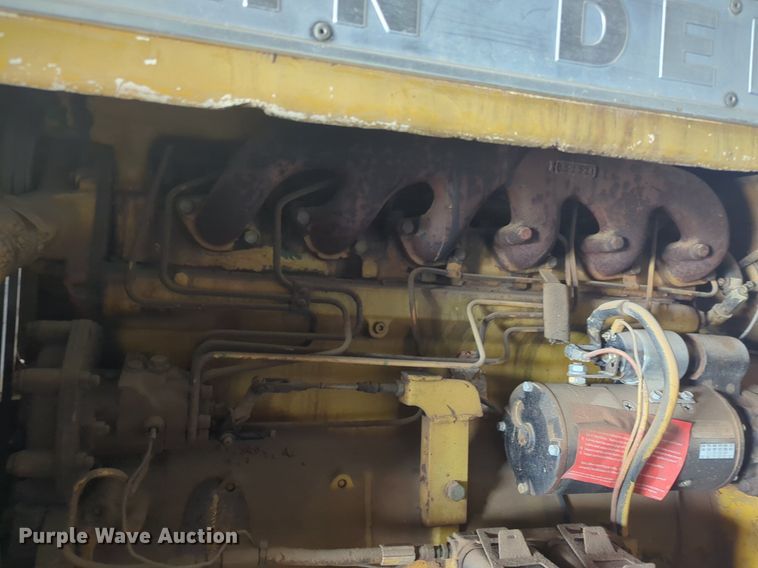 image for item NZ9378 John Deere  570 motor grader