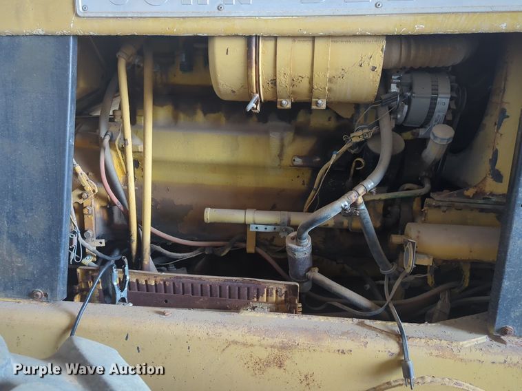 image for item NZ9378 John Deere  570 motor grader