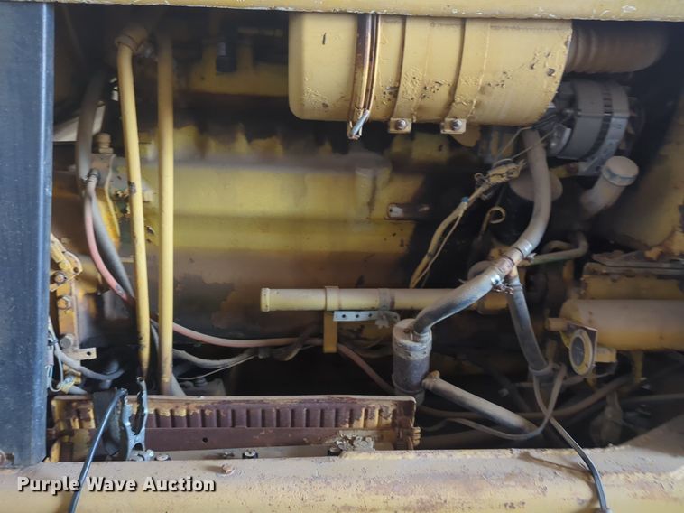 image for item NZ9378 John Deere  570 motor grader