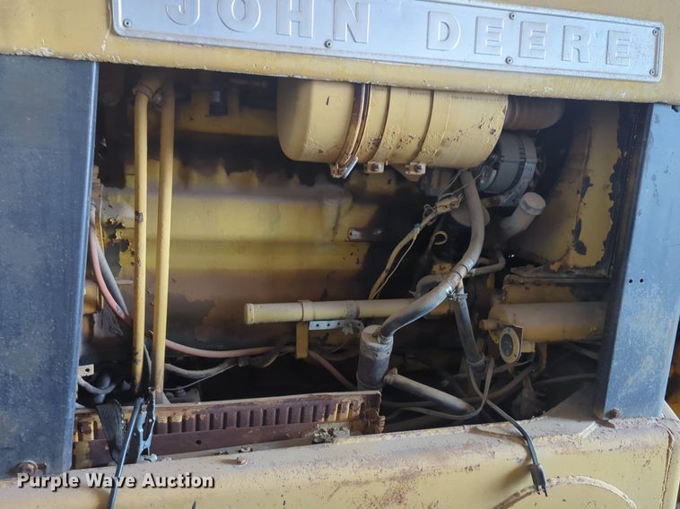 image for item NZ9378 John Deere  570 motor grader