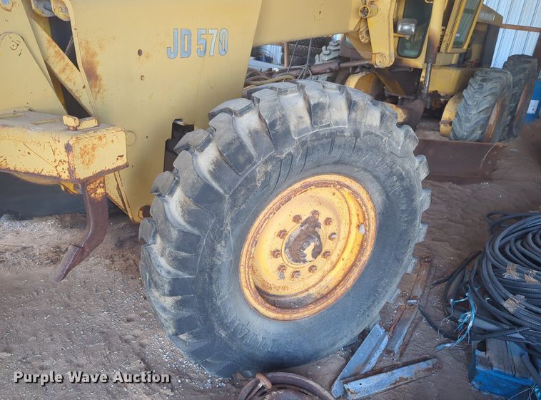 image for item NZ9378 John Deere  570 motor grader