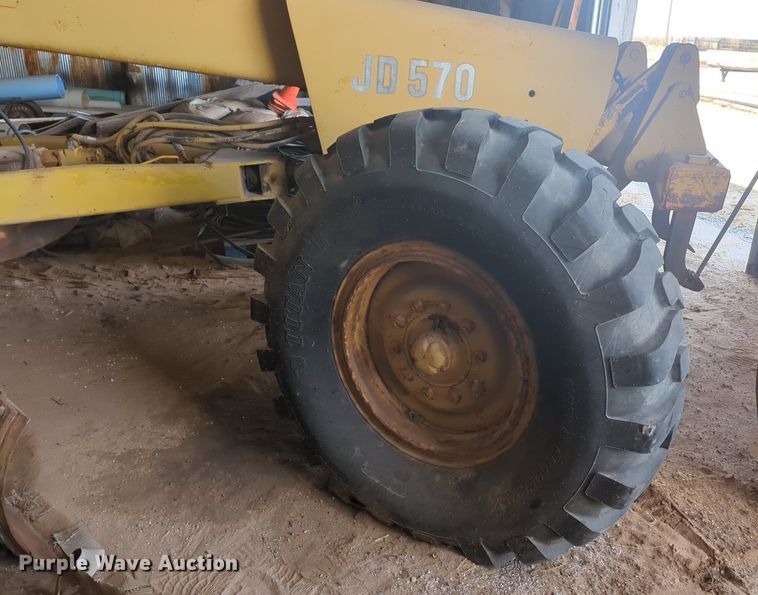 image for item NZ9378 John Deere  570 motor grader