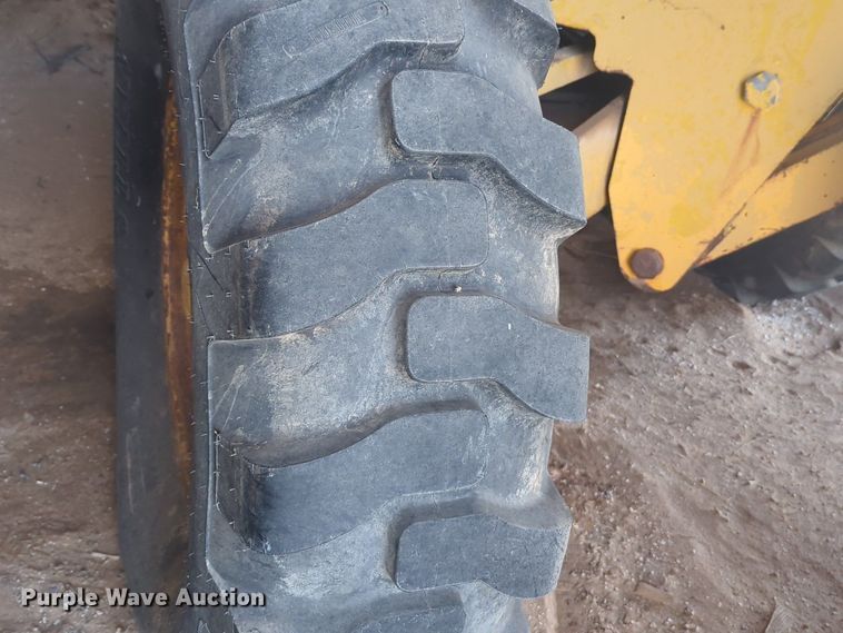 image for item NZ9378 John Deere  570 motor grader