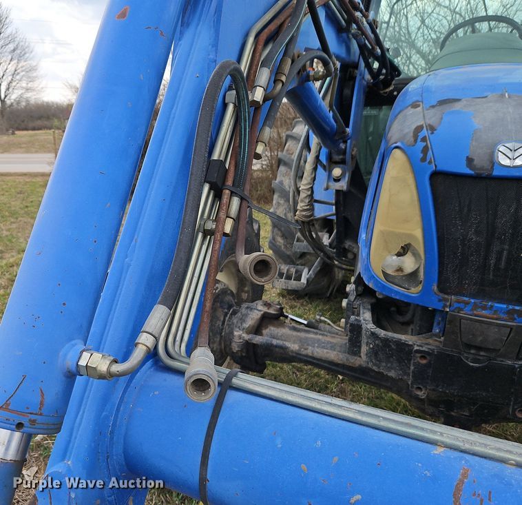 image for item EI3599 2006 New Holland  TL100ADT MFWD tractor