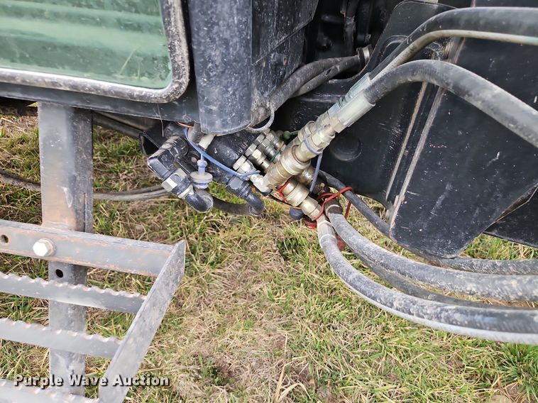 image for item EI3599 2006 New Holland  TL100ADT MFWD tractor