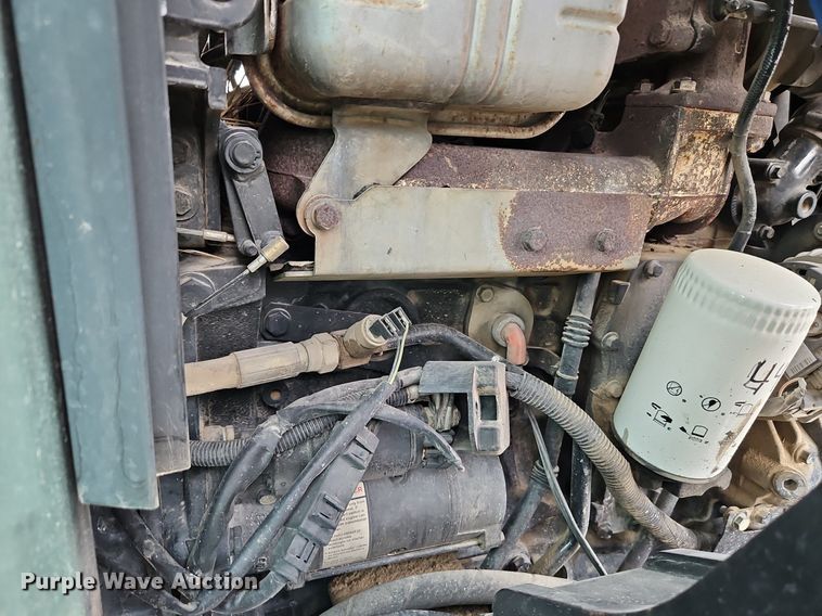 image for item EI3599 2006 New Holland  TL100ADT MFWD tractor