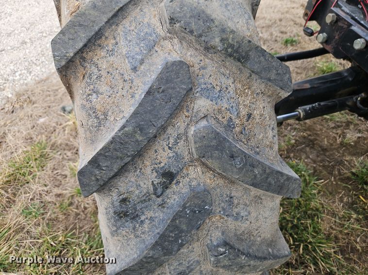 image for item EI3599 2006 New Holland  TL100ADT MFWD tractor