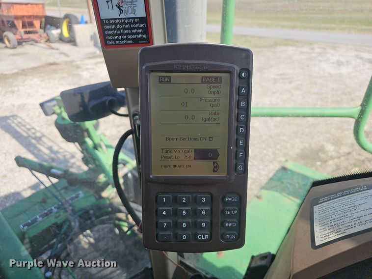 image for item EJ6064 1999 John Deere 4700 sprayer