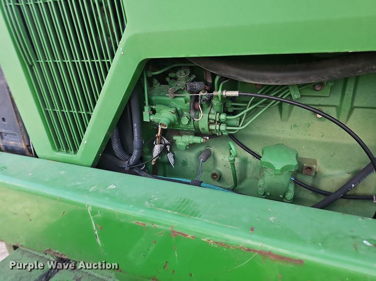 image for item EJ6064 1999 John Deere 4700 sprayer